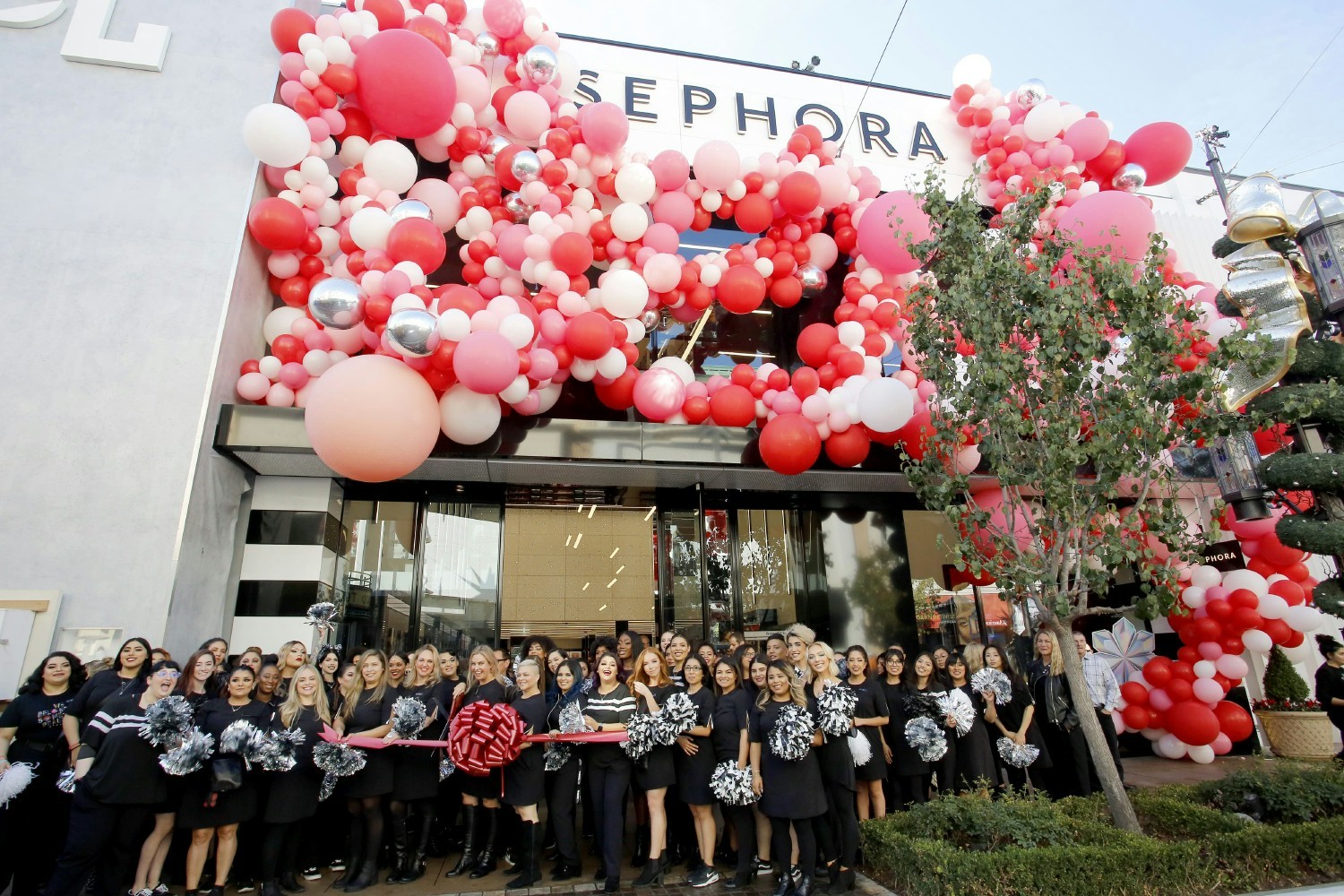 Sephora employees celebrating a store opening.